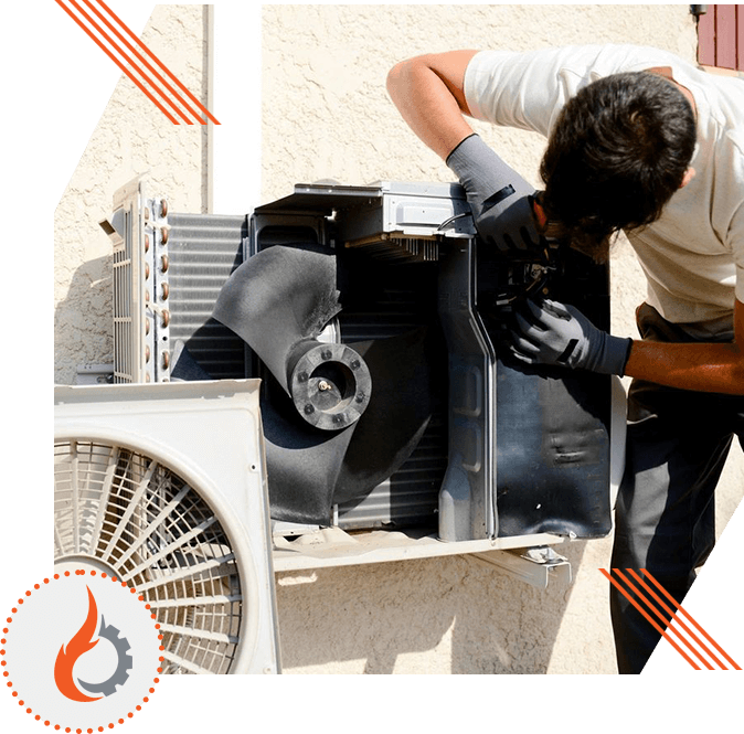 Young Man Electrician Installer Working on Outdoor Compressor Unit Air Conditioner at a Client's Home